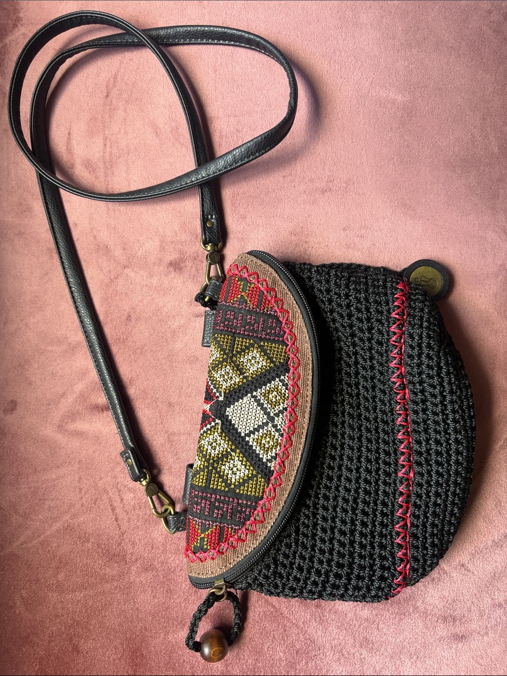 The Sak Handwoven Black Crossbody Bag with Multicolor Embroidered Flap